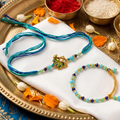 Peacock Charm Couple Rakhi Set – Bhai & Bhabhi