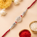 Silver Om Rakhi – Elegant Spiritual Thread